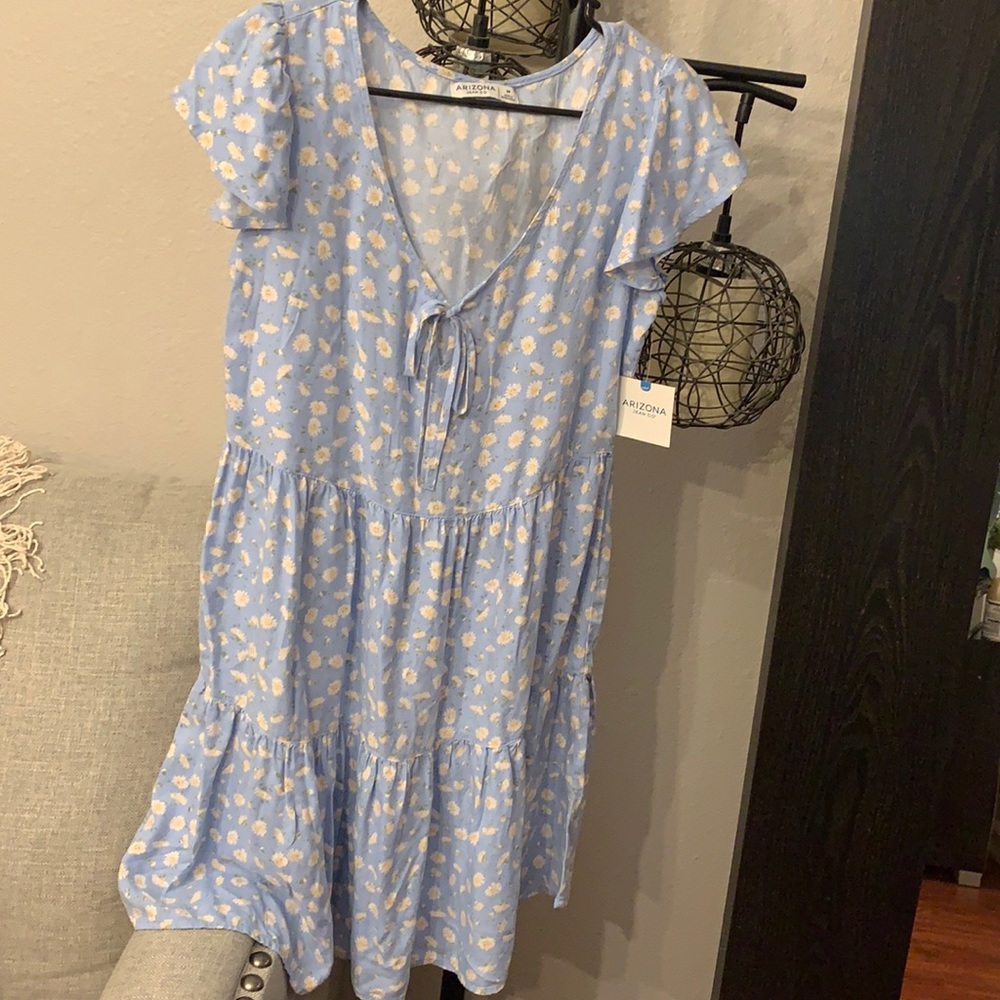 Sun dress, never been worn. With tags on dress.